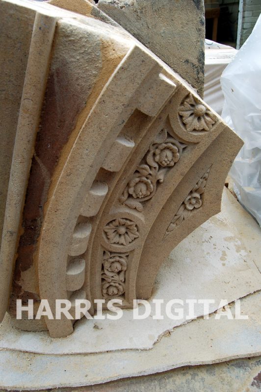 Carved voussoir piece repair